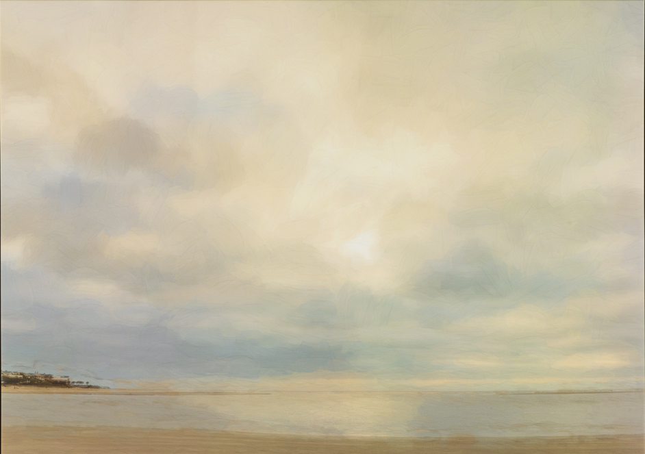 an image of a large, moody sky with clouds over an empty calm beach with a small strip of dunes